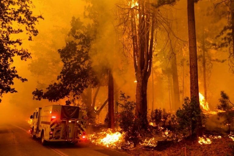 California wildfire rages as US bakes in record-setting heat wave