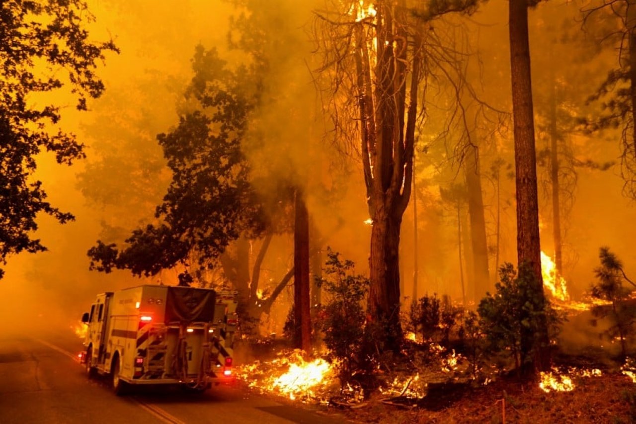 California wildfire rages as US bakes in record-setting heat wave