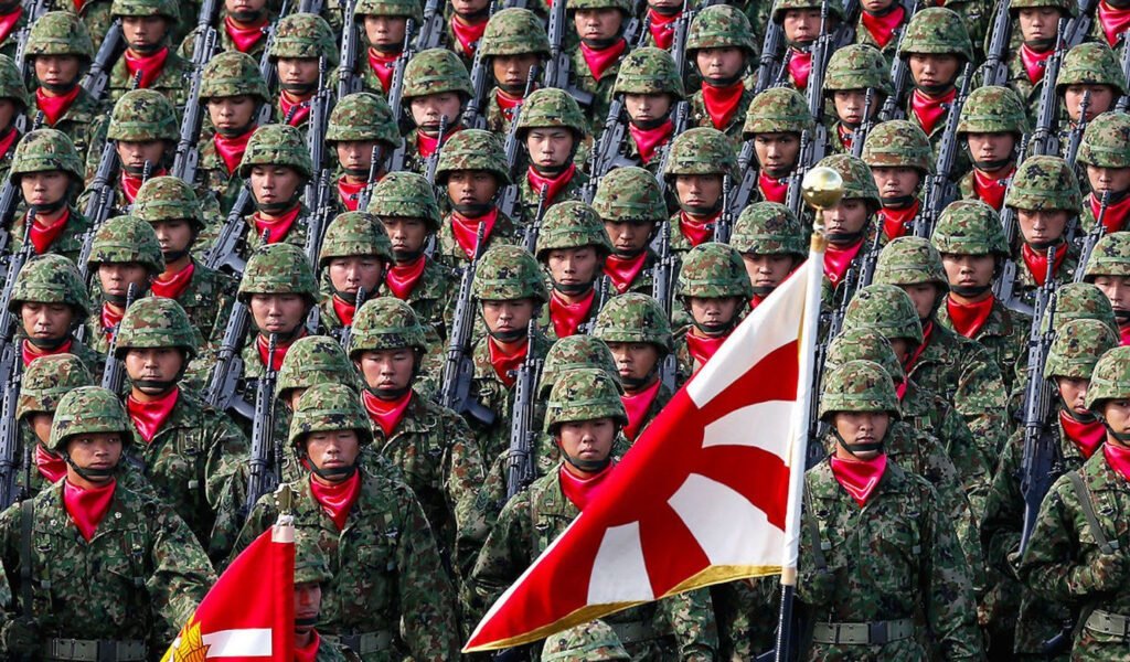 Japan changes rules to allow aid to foreign militaries