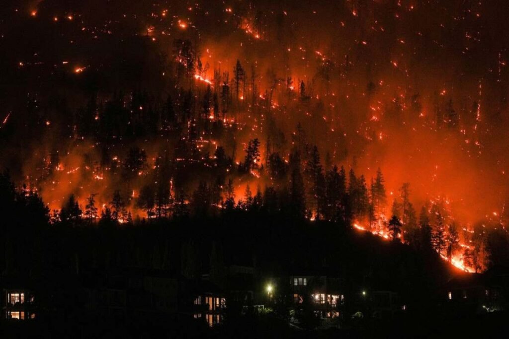 Wildfires threaten western Canada city as far north evacuated