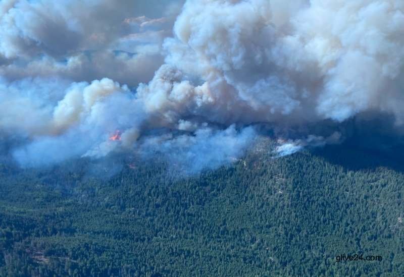 Wildfires threaten western Canada city as far north evacuated