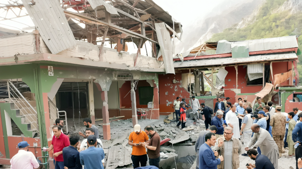 People inspect a damaged mosque following India's strikes in Muzaffarabad in Pakistan-administered Kashmir, Source AFP