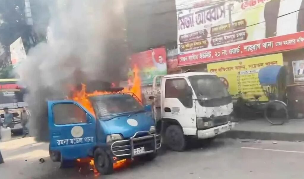 Fire Breaks Out in Police Vehicle in Front of Ramna Police Station Fire Breaks Out in Police Car and Microbus in Dhaka