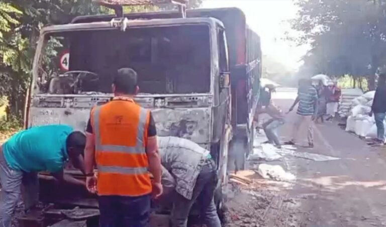 Fire on a cargo truck and attack on police vehicles in Madaripur Truck Set Ablaze and Police Vehicle Vandalised in Shibchar