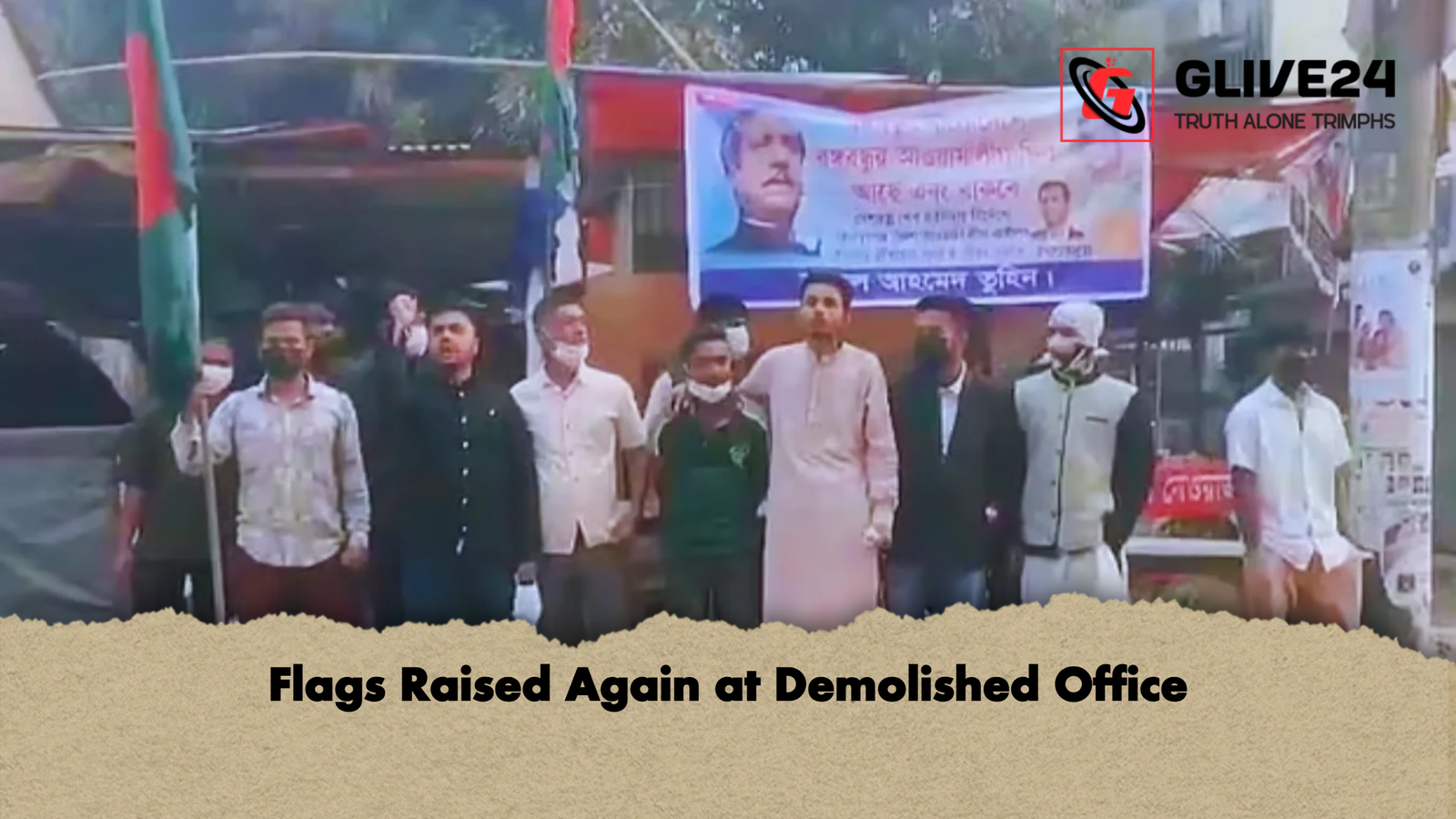 Flags Raised Again at Demolished Office Flags Raised Again at Demolished Office