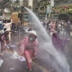 কেন্দ্রীয় ব্যাংকের সামনে বিক্ষোভ করছে একীভূত পাঁচ ব্যাংকের আমানতকারীরা Five Merged Banks Depositors Rally Over Low Returns at Central Bank