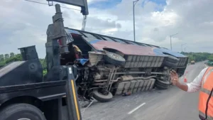 Bus Overturns on Padma Bridge Approach Injuring Eight Passengers Bus Overturns on Padma Bridge Approach, Injuring Eight Passengers