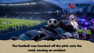 The football was knocked off the pitch onto the road causing an accident. 2 The football was knocked off the pitch onto the road, causing an accident.